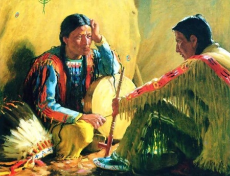 Indiani che fumano la pipa sacra